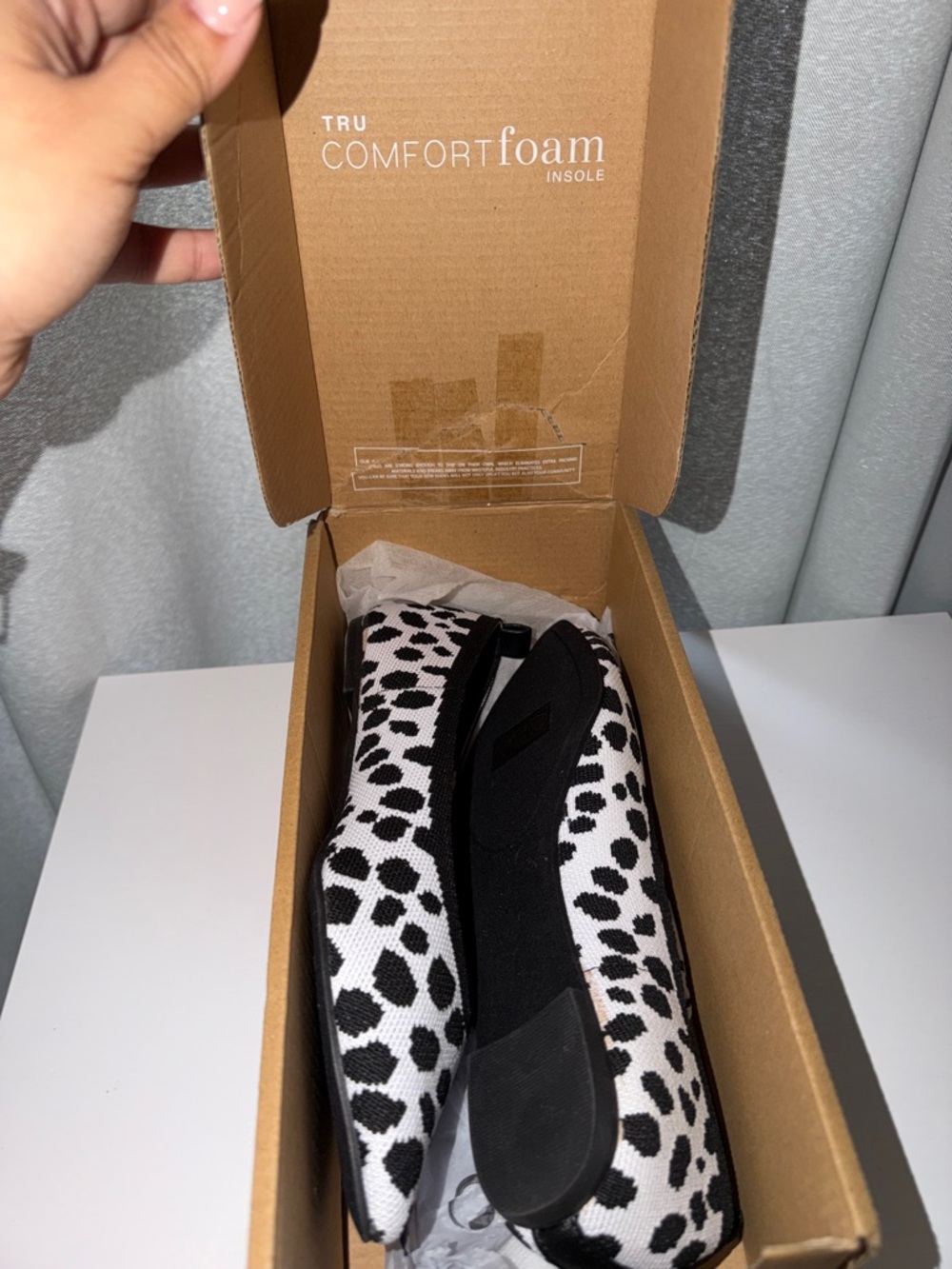 Rothy's Black and White Spot Knit Slip-On Flats